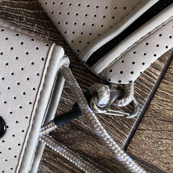 NWOT ah•dorned Neoprene perforated shoulder tan bag - Picture 4 of 16